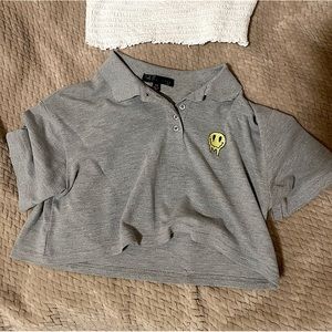 Heather grey drippy smiley collared crop top